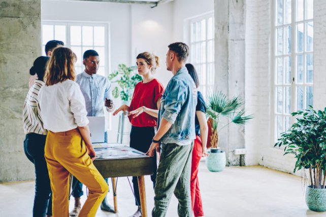 people talking around a table